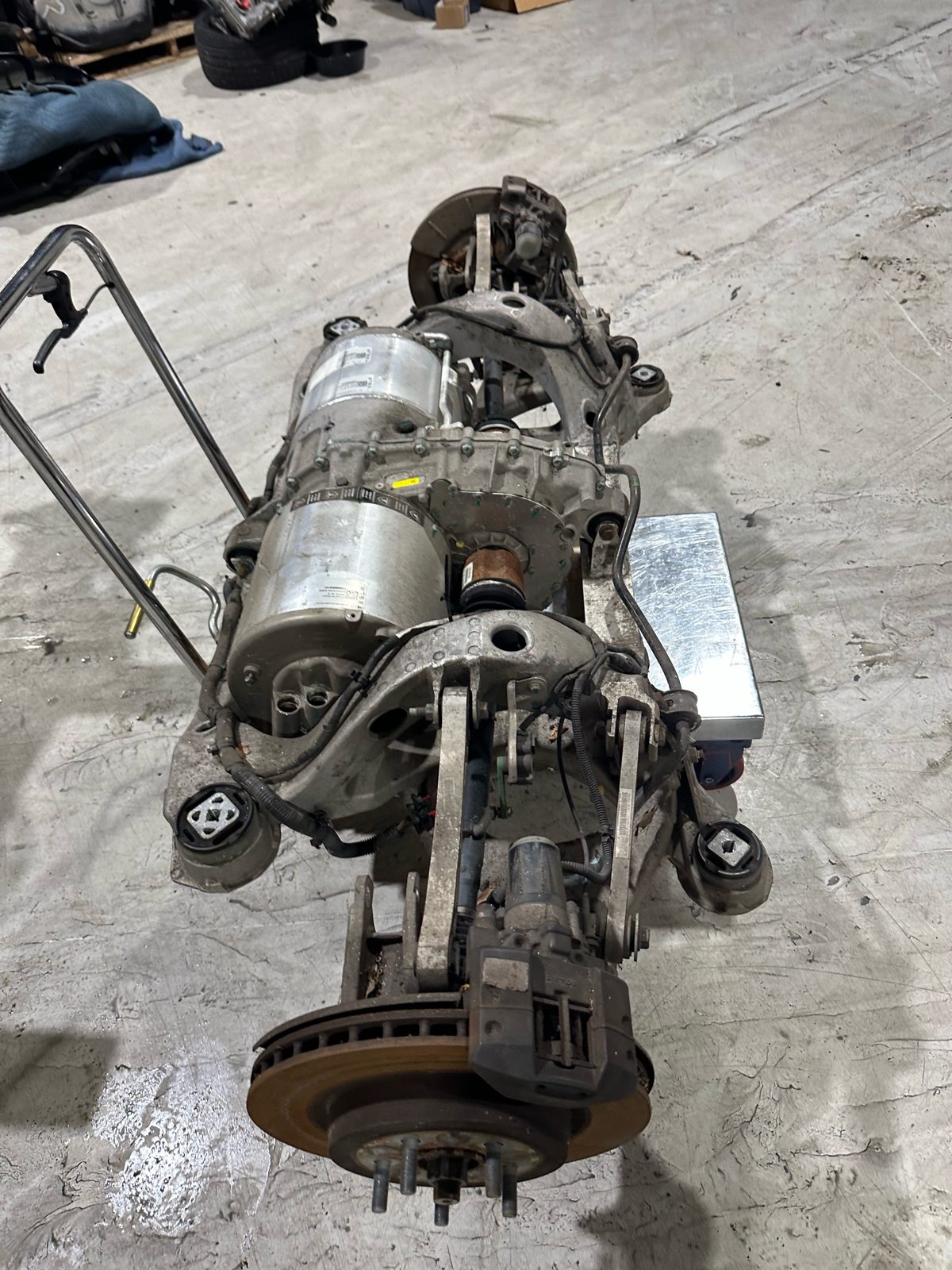 Tesla Model S rear drive unit removed for a coolant leak LDU bypass repair